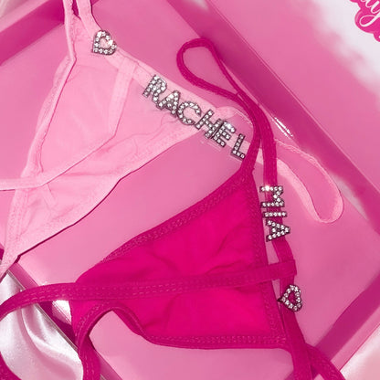 Pink lingerie set with rhinestone charmss custom on a pink background